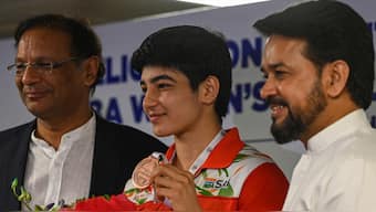 File image of Indian boxer Parveen Hooda (centre). AFP