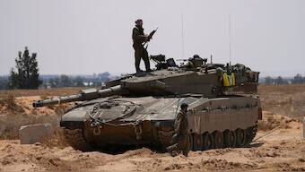 Israeli soldiers are seen near the border with the Gaza Strip, in southern Israel, Tuesday, May 7, 2024. -AP