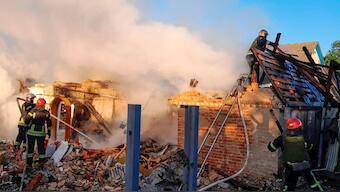 In this photo provided by the Ukrainian Emergency Service, rescuers work at a damaged building after a Russian missile attack in Kyiv region, Ukraine, Wednesday, May 8, 2024.- AP