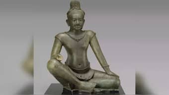This August 2006 photo shows a late 10th to early 11th-century sculpture titled "The Bodhisattva Avalokiteshvara Seated in Royal Ease" at the Metropolitan Museum of Art in New York. The sculpture is one of 16 pieces of artwork that the museum said it will return to Cambodia and Thailand that federal prosecutors say were tied to an art dealer and collector accused of running a huge antiquity trafficking network out of Southeast Asia. (Metropolitan Museum of Art via AP)