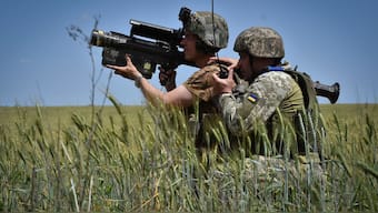 Ukrainian servicemen search a target with a US Stinger air defence missile launcher on the front line in Zaporizhzhia region, Ukraine, Tuesday, May 28, 2024- AP