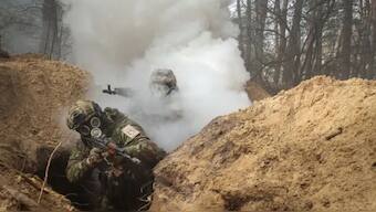 Ukrainian servicemen take part in radiation, chemical and biological hazard drills. File Photo- Reuters 