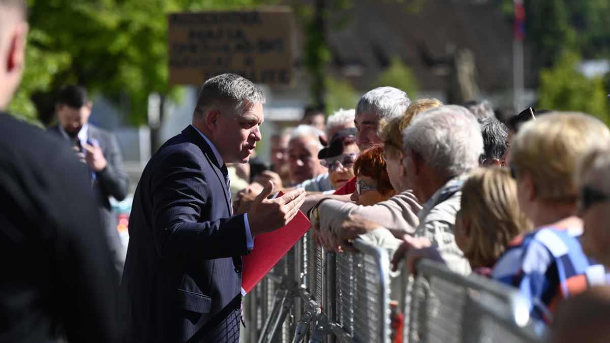 Slovakia's Prime Minister Robert Fico, centre, speaks with people before the cabinet's away-from-home session in the town of Handlova, Slovakia on 15 May, 2024. AP Slovakia's Prime Minister Robert Fico, centre, speaks with people before the cabinet's away-from-home session in the town of Handlova, Slovakia on 15 May, 2024. AP