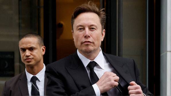Why Tesla layoffs could be bad news for Biden