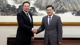 Tesla CEO Elon Musk,  with Foreign Minister Qin Gang during a meeting in Beijing. Image Credit: AFP