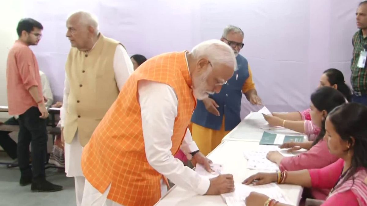 PM Narendra Modi at Gandhinagar pollling booth. Courtesy: ANI PM Narendra Modi at Gandhinagar pollling booth. Courtesy: ANI