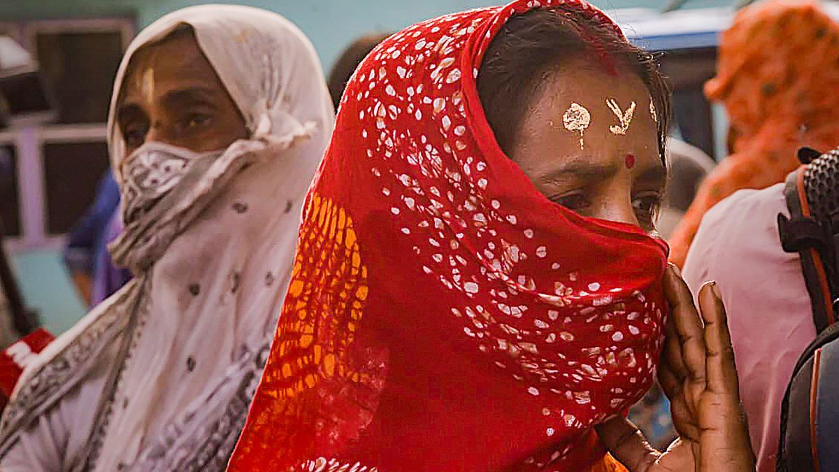 Talking to reporters, the woman, accompanied by others, claimed that they actually wanted to complain about not receiving payment for the 100 days MNREGA job scheme. PTI file Talking to reporters, the woman, accompanied by others, claimed that they actually wanted to complain about not receiving payment for the 100 days MNREGA job scheme. PTI file
