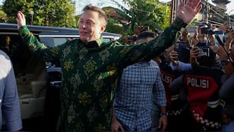 Elon Musk, chief executive officer of SpaceX and Tesla, greets the media as he arrives to launch SpaceX's Starlink internet service in Indonesia at a sub district community health center in Denpasar, Bali, May 19, 2024. REUTERS