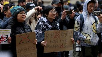 Protesters take part in a rally in solidarity with Hong Kong residents, as the Article 23 national security laws come into force, in London, Britain, March 23, 2024. Reuters