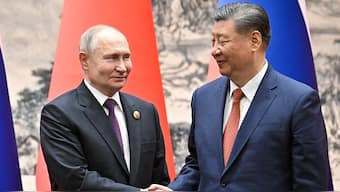 (File) Russian President Vladimir Putin shakes hands with Chinese President Xi Jinping during a meeting in Beijing, China on 16 May, 2024. Reuters