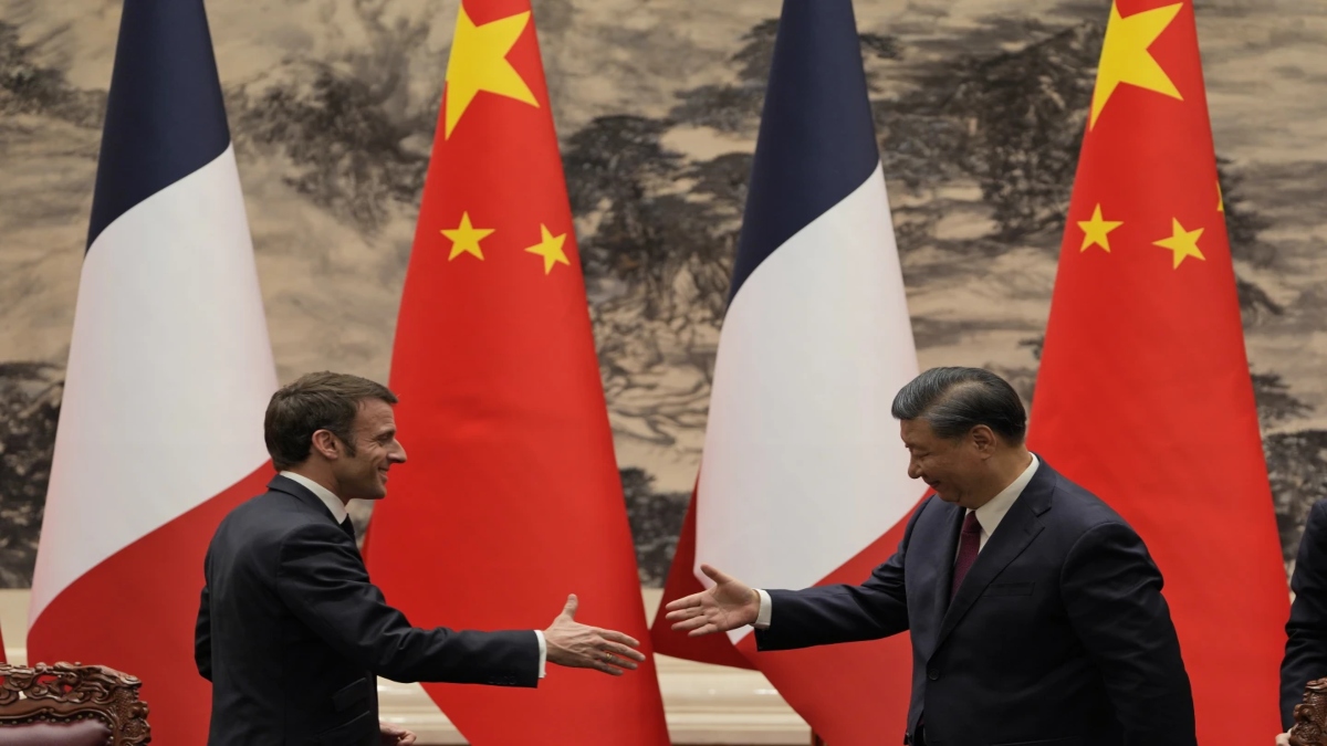 French President Emmanuel Macron shakes hands with Chinese President Xi Jinping, Source: File Image / AP French President Emmanuel Macron shakes hands with Chinese President Xi Jinping, Source: File Image / AP