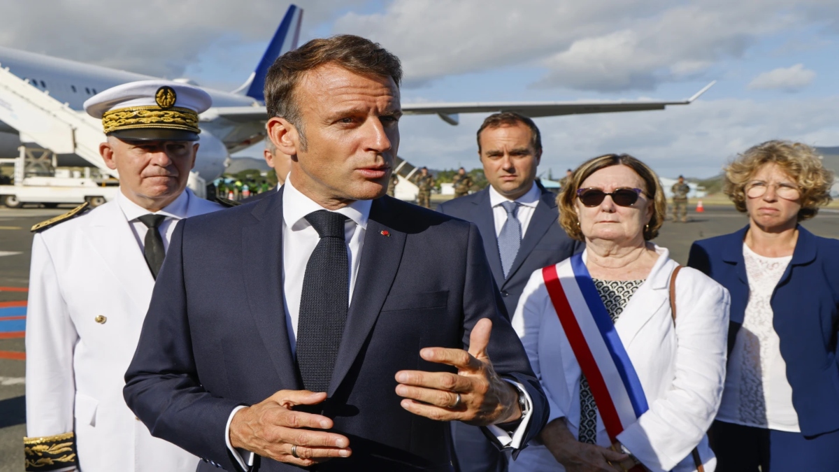 French President Emmanuel Macron speaks to reports after arriving in in New Caledonia. Source: AP French President Emmanuel Macron speaks to reports after arriving in in New Caledonia. Source: AP