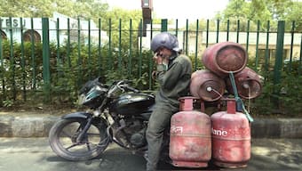 A gas cylinder delivery person wipes his sweat as takes a breather in the shade of a tree on a hot summer day in New Delhi. On Wednesday, the people of Delhi were shocked when the sensor in Delhi’s Mungeshpur automatic weather station touched 52.9 degrees Celsius. AP