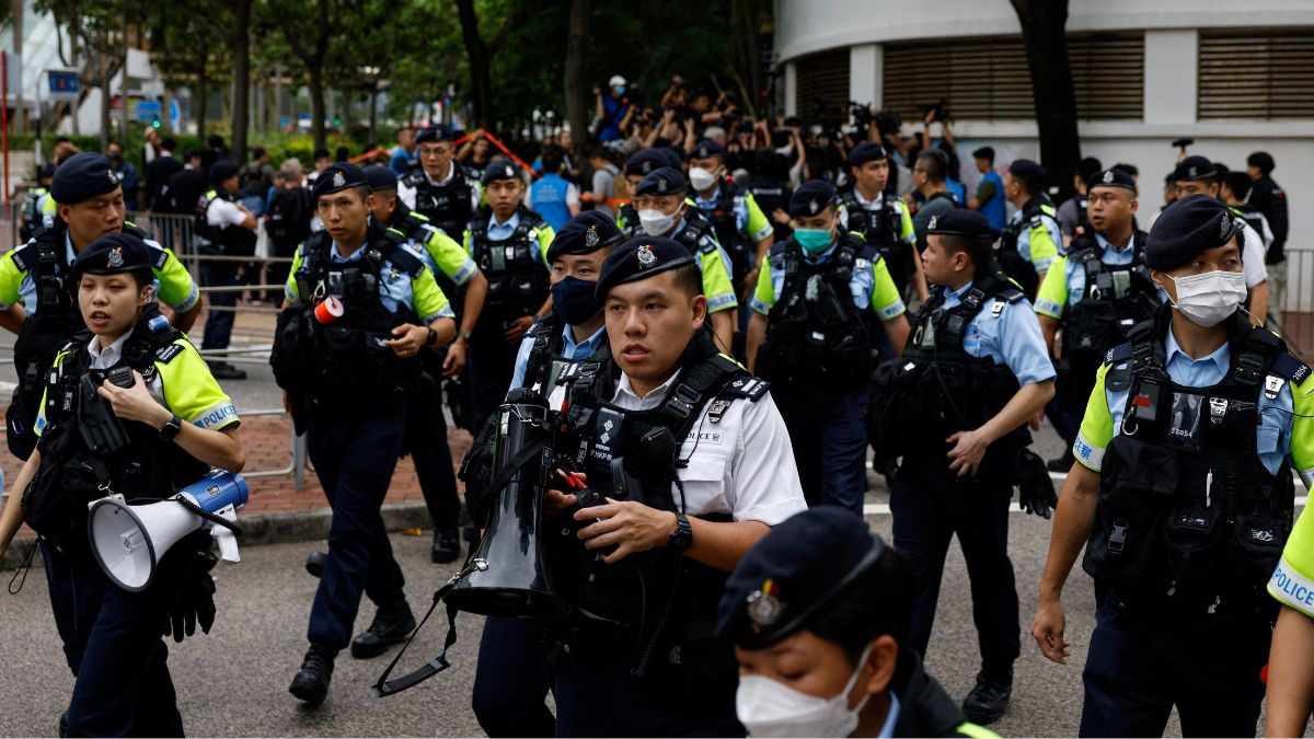 Police stand guard outside the West Kowloon Magistrates' Courts building during the verdict of the 47 pro-democracy activists charged under the national security law, in Hong Kong, China, 30 May, 2024. Reuters Police stand guard outside the West Kowloon Magistrates' Courts building during the verdict of the 47 pro-democracy activists charged under the national security law, in Hong Kong, China, 30 May, 2024. Reuters