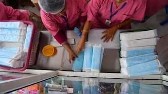 Employees prepare sanitary pads in Mumbai. It is reported that the country generates a whopping 12 billion disposable sanitary napkins every year, majority of which are non-biodegradable in nature. File image/AFP