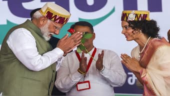 Prime Minister Narendra Modi with BJP candidate from Mandi constituency Kangana Ranaut during a public meeting for Lok Sabha elections, in Mandi, Himachal Pradesh. Both, PM Modi and Ranaut will be the big faces in Phase 7 of the Lok Sabha elections. File image/PTI