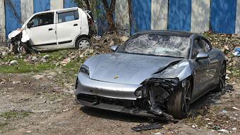 The Porsche car found without number plate, in Pune, Tuesday. The vehicle was allegedly driven by a 17-year-old boy who knocked down two motorbike riders on Sunday, causing their death. PTI 