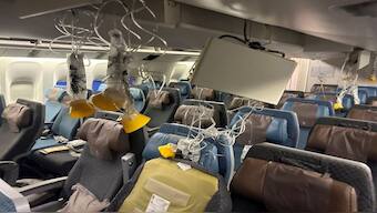 The interior of Singapore Airline flight SQ321 after it made an emergency landing at Bangkok's Suvarnabhumi International Airport, Thailand, following its encounter with severe turbulence, which killed one person and injured another 71. Reuters