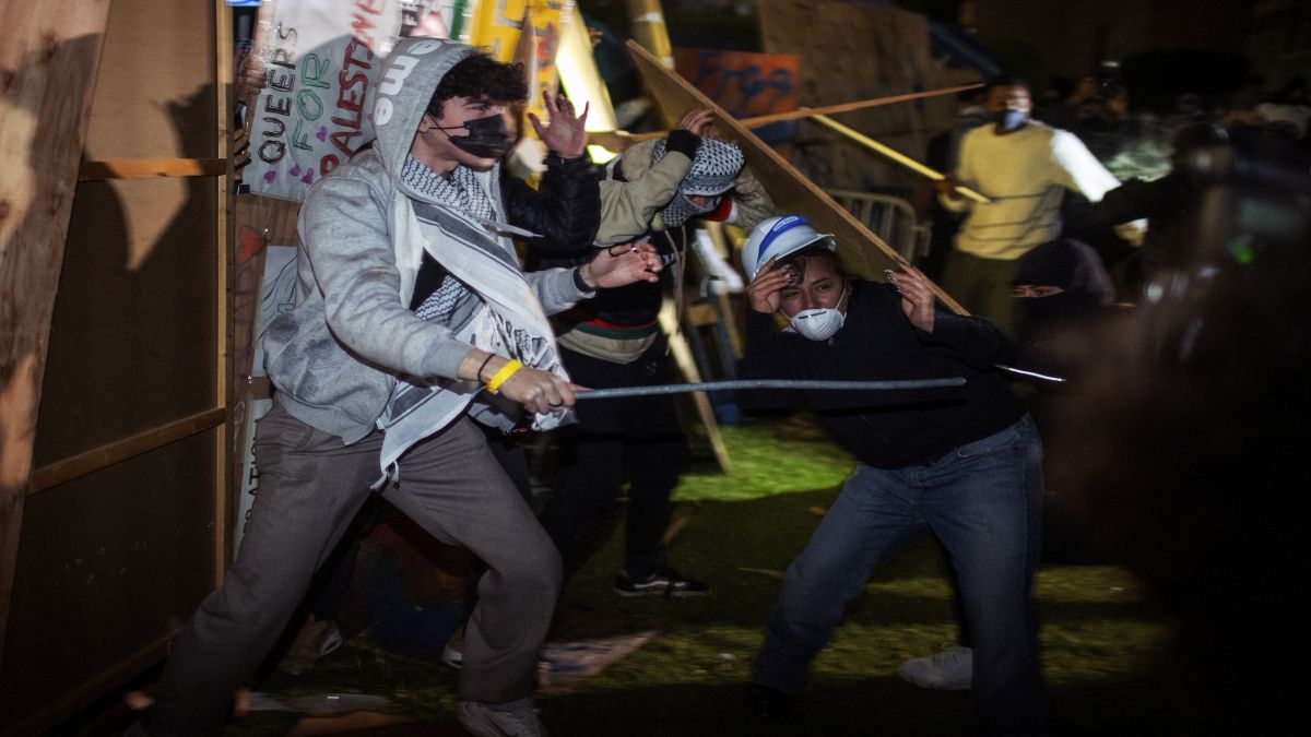 Demonstrators clash at a pro-Palestinian encampment at the University of California, Los Angeles. AP Demonstrators clash at a pro-Palestinian encampment at the University of California, Los Angeles. AP