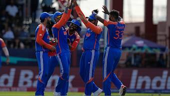 Team India players celebrate their 68-run win over England in the second semi final of the T20 World Cup in Guyana on Thursday. AP 