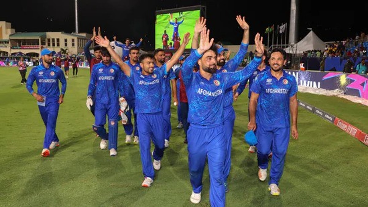 Afghanistan's cricket team captain, Rashid Khan, and teammates acknowledge fans after advancing to the ICC Men's T20 World Cup semi-finals, beating Bangladesh. Image: PTI Afghanistan's cricket team captain, Rashid Khan, and teammates acknowledge fans after advancing to the ICC Men's T20 World Cup semi-finals, beating Bangladesh. Image: PTI