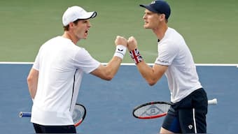 Andy Murray and brother Jamie during a double match. Reuters