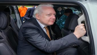 WikiLeaks founder Julian Assange leaves the federal court in Saipan, Mariana Islands, on Wednesday. AP 