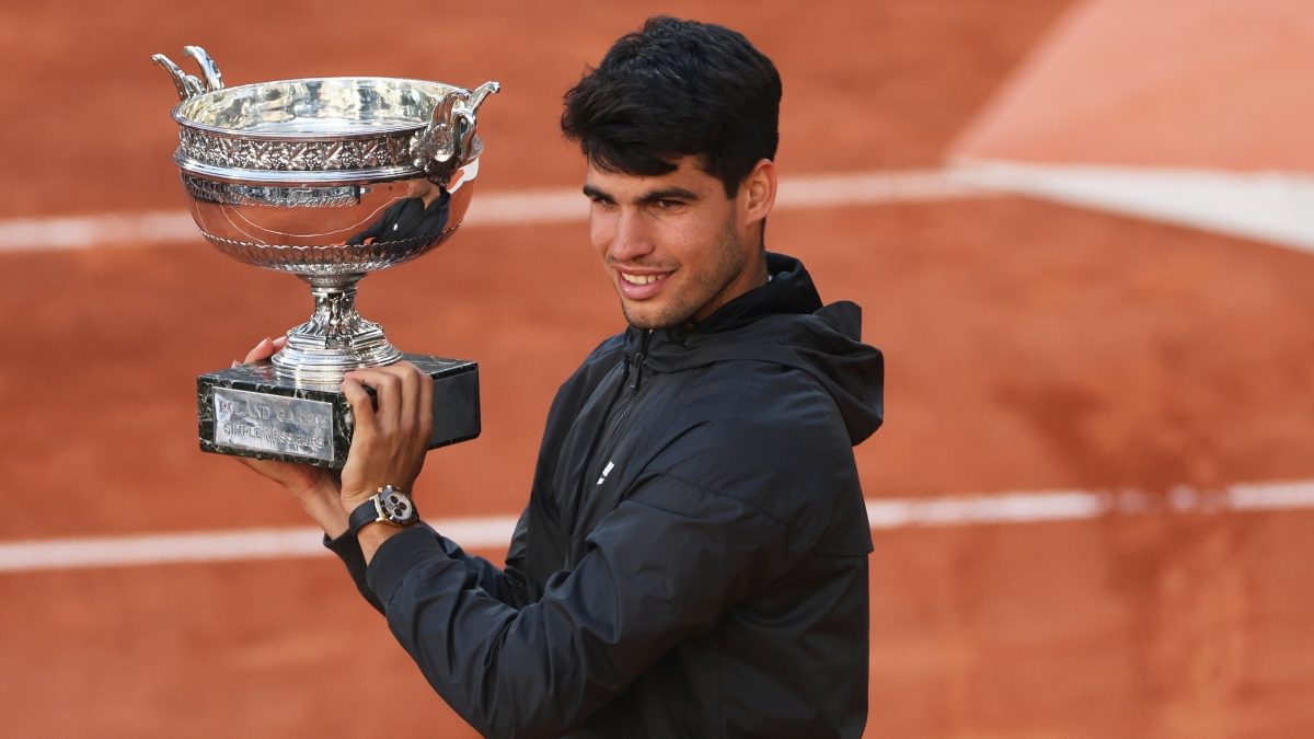 Carlos Alcaraz poses with the French Open trophy after beating Alexander Zverev in the final on Sunday. AP Carlos Alcaraz poses with the French Open trophy after beating Alexander Zverev in the final on Sunday. AP