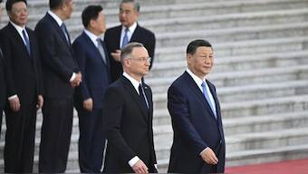 Chinese President Xi Jinping and Poland's President Andrzej Duda attend the welcome ceremony at the Great Hall of the People in Beijing on June 24. Source: AP.