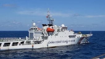 A China Coast Guard vessel manoeuvres near Philippine Coast Guard vessel BRP Teresa Magbanua near Scarborough Shoal in the South China Sea. Image: REUTERS