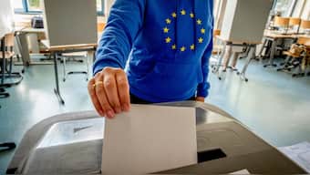 A woman casts her ballot for the European elections in a polling station in Frankfurt, Germany, 9 June, 2024. AP