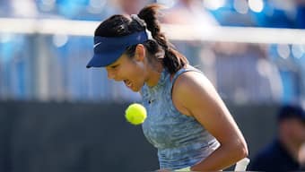 Emma Raducanu celebrates after winning a point against Jessica Pegula in Eastbourne, a Wimbledon warm-up tournament. AP