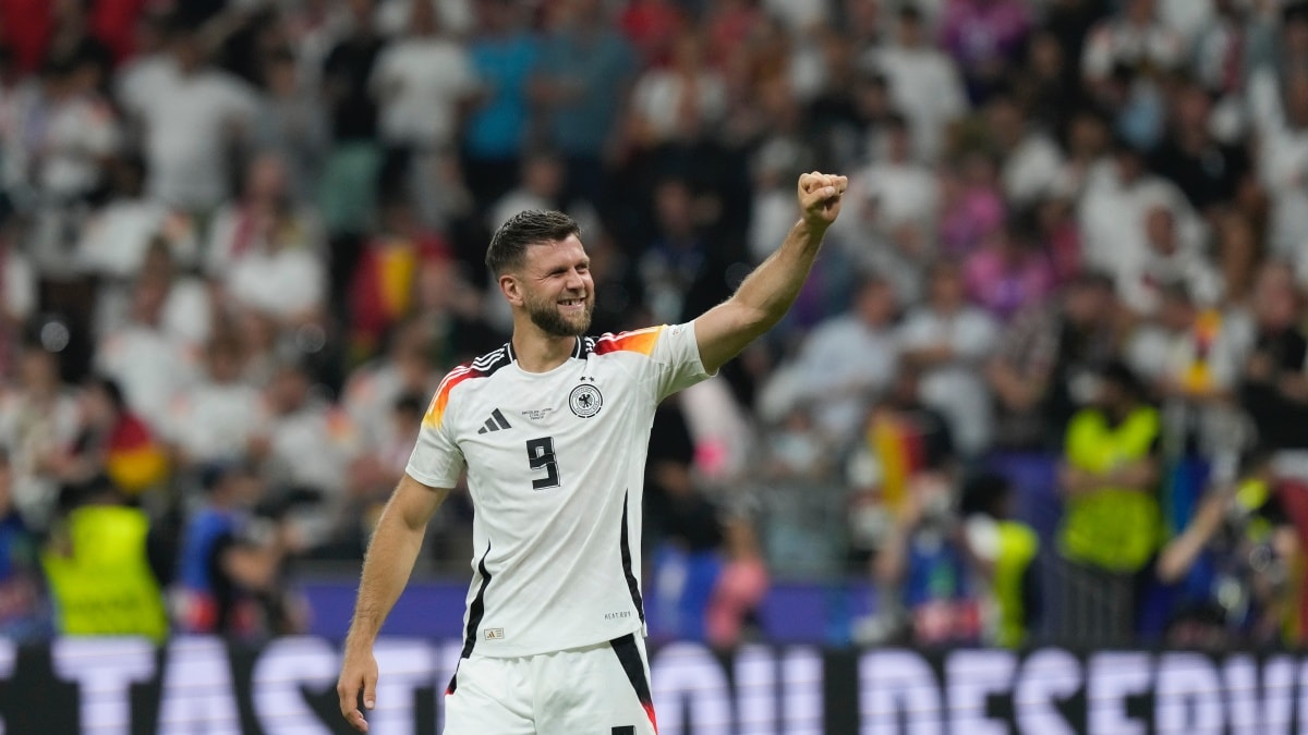 Euro 2024: Last-gasp Niclas Fuellkrug goal rescues top spot for hosts Germany against Switzerland