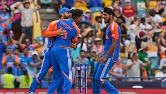 All-rounder Hardik Pandya celebrates with Virat Kohli and Arshdeep Singh after bowling India to a seven-run victory over South Africa in the final of the 2024 T20 World Cup with a heroic final over. AP