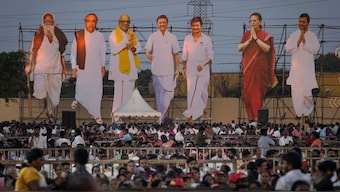 Giant cutouts of opposition political party leaders tower over supporters during a rally, on the outskirts of Chennai, Tamil Nadu, 15 April, 2024. File Image/AP