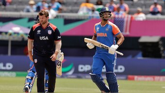 India's Shivam Dube runs between the wickets as USA's Corey Anderson goes back to the top of his bowling mark during their T20 World Cup Group A clash in New York. AP