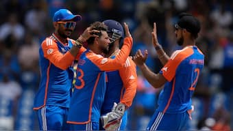 Kuldeep Yadav celebrates the wicket of Glenn Maxwell during India's T20 World Cup match against Australia. AP 