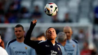 Kylian Mbappe warms up ahead of France's friendly clash against Canada ahead of Euro 2024. Reuters