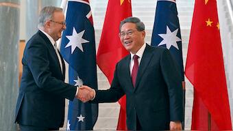 Chinese Premier Li Qiang and Australia's Prime Minister Anthony Albanese shake hands at Parliament House in Canberra, Australia on 17 June, 2024. AP
