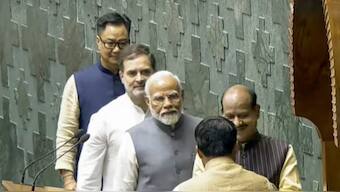 Prime Minister Narendra Modi, Leader of the Opposition (LoP) Rahul Gandhi and Union Minister for Parliamentary Affairs Kiren Rijiju escort Om Birla to the Lok Sabha Speaker's chair. Source: PTI.