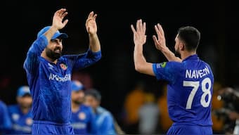 Afghanistan have kept their T20 World Cup semi-final hopes alive after beating former champions Australia by 21 runs in St Vincent. AP