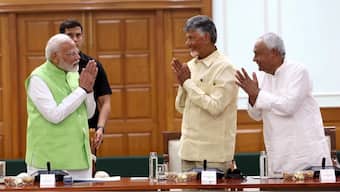 Narendra Modi with TDP chief Chandrababu Naidu and JD(U) chief Nitish Kumar during NDA meeting, on Wednesday. Source: PTI. 