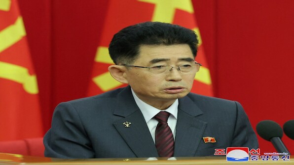 Kim Jong Un's image takes center stage as North Korean officials wear new pins