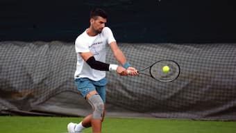 Serbia's Novak Djokovic practices during a training session at the All England Lawn Tennis and Croquet Club in Wimbledon ahead of the Wimbledon Championships, which begins on July 1st, in London, Monday June 24, 2024. (John Walton/PA via AP)
