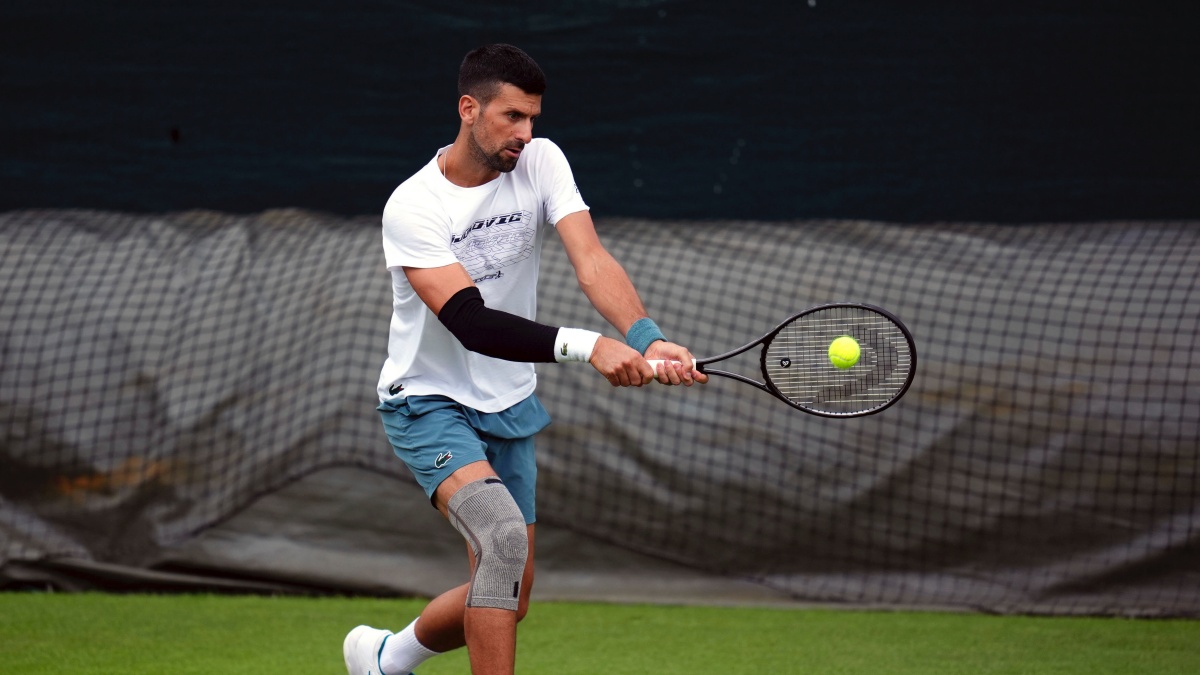 Serbia's Novak Djokovic practices during a training session at the All England Lawn Tennis and Croquet Club in Wimbledon ahead of the Wimbledon Championships, which begins on July 1st, in London, Monday June 24, 2024. (John Walton/PA via AP) Serbia's Novak Djokovic practices during a training session at the All England Lawn Tennis and Croquet Club in Wimbledon ahead of the Wimbledon Championships, which begins on July 1st, in London, Monday June 24, 2024. (John Walton/PA via AP)