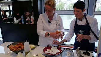 Chefs prepare a dish that will be available for the athletes during the Paris 2024 Olympic. Reuters
