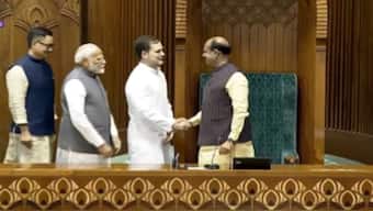 Prime Minister Narendra Modi, LoP Rahul Gandhi and Parliamentary Affairs Minister Kiren Rijiju accompany Om Birla to the Chair after he was elected as the Speaker of Lok Sabha on Wednesday. ANI