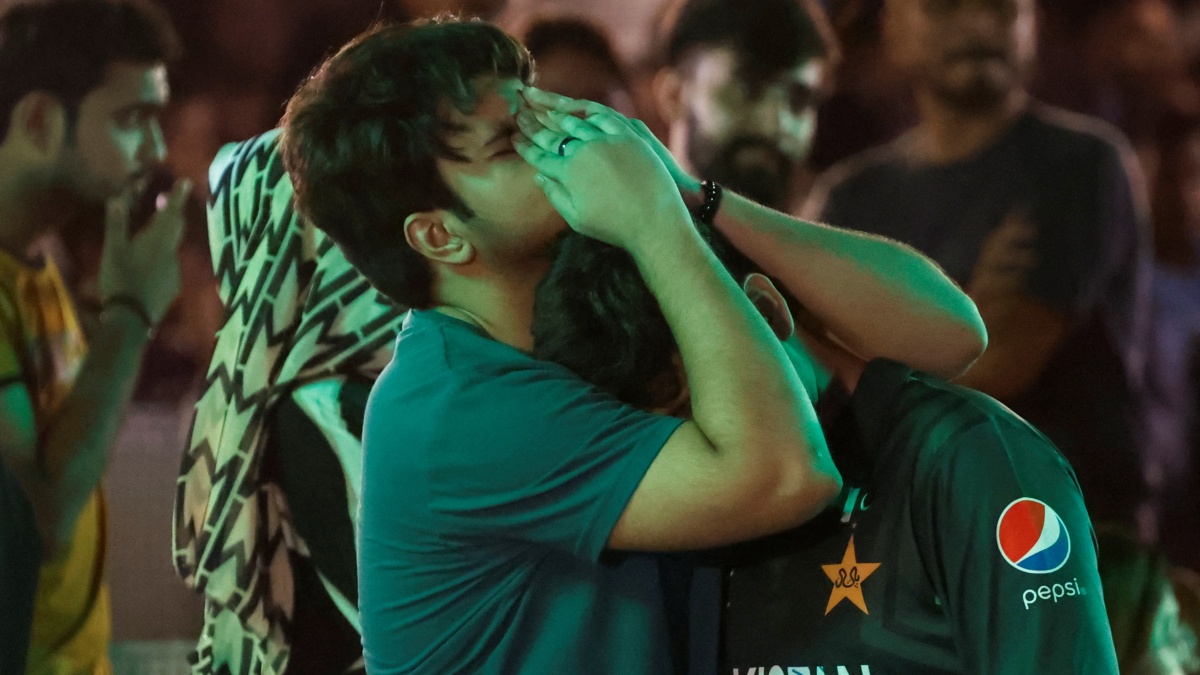 Pakistan cricket fans react as they watch the T20 World Cup match against India on a big screen in Karachi. Reuters Pakistan cricket fans react as they watch the T20 World Cup match against India on a big screen in Karachi. Reuters