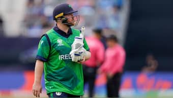 Ireland's captain Paul Stirling walks back after being dismissed during the T20 World Cup game against India. AP 