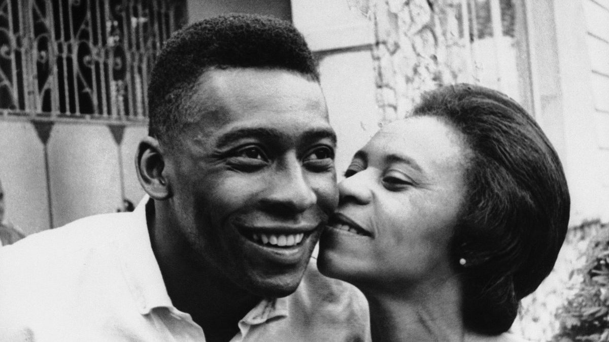 FILE - Pele stands with his mother Celeste Arantes do Nascimento in an unknown location in Brazil, in March of 1965. AP FILE - Pele stands with his mother Celeste Arantes do Nascimento in an unknown location in Brazil, in March of 1965. AP